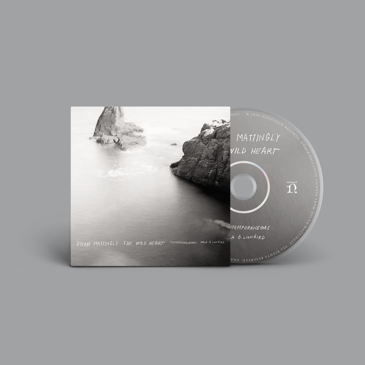 Black and white CD case with a rocky coastline image.