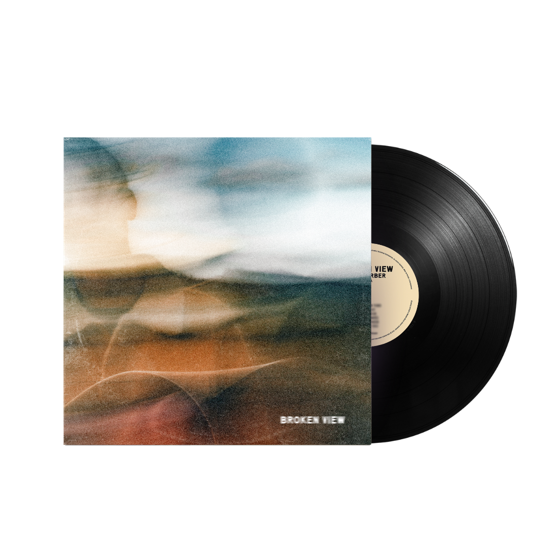 Vinyl record with abstract portrait cover art in muted, grainy tones.