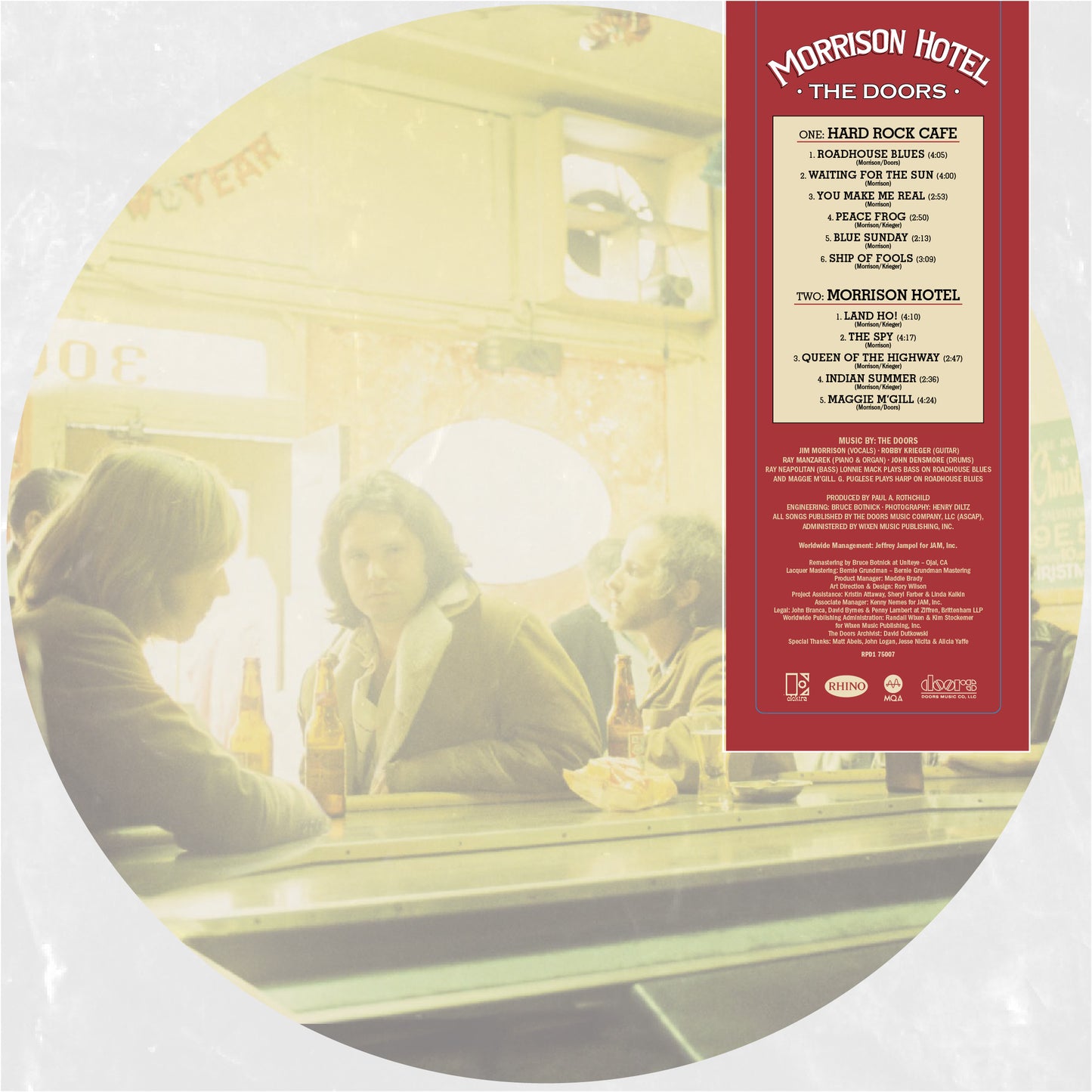 The Doors Morrison Hotel vinyl cover featuring the band members sitting at a bar.