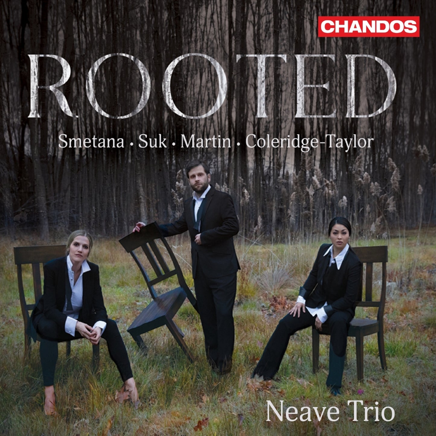 CD cover for Neave Trio’s “Rooted” featuring three musicians in formal wear.