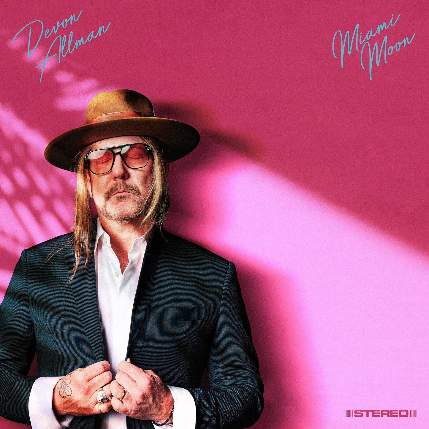 Devon Allman album cover, "Miami Moon," featuring a portrait of the artist.