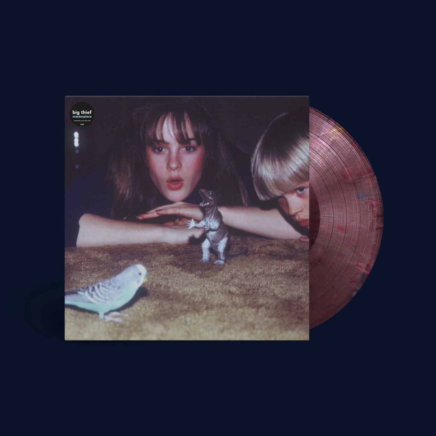 Big Thief’s “Masterpiece” vinyl album cover with two people and a lizard.