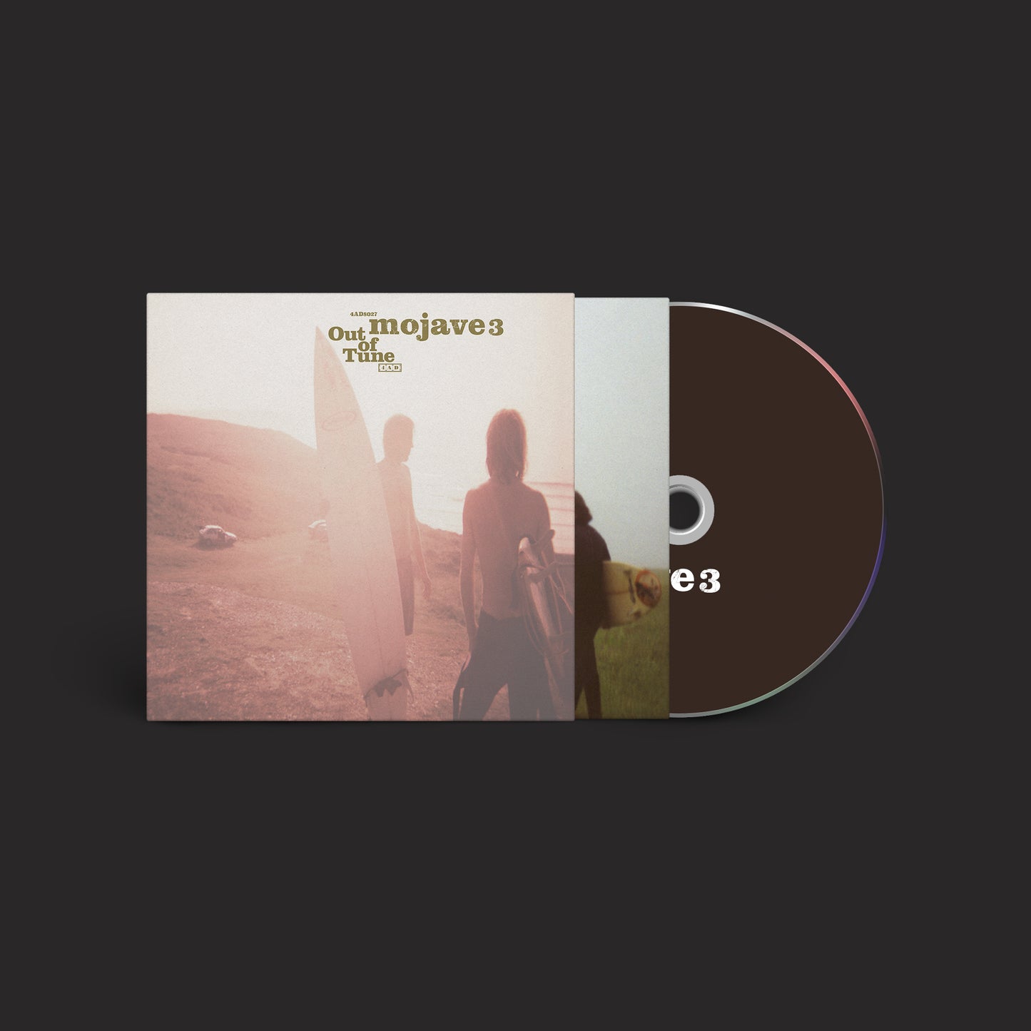 CD cover with a beach scene and a silver reflective disc.