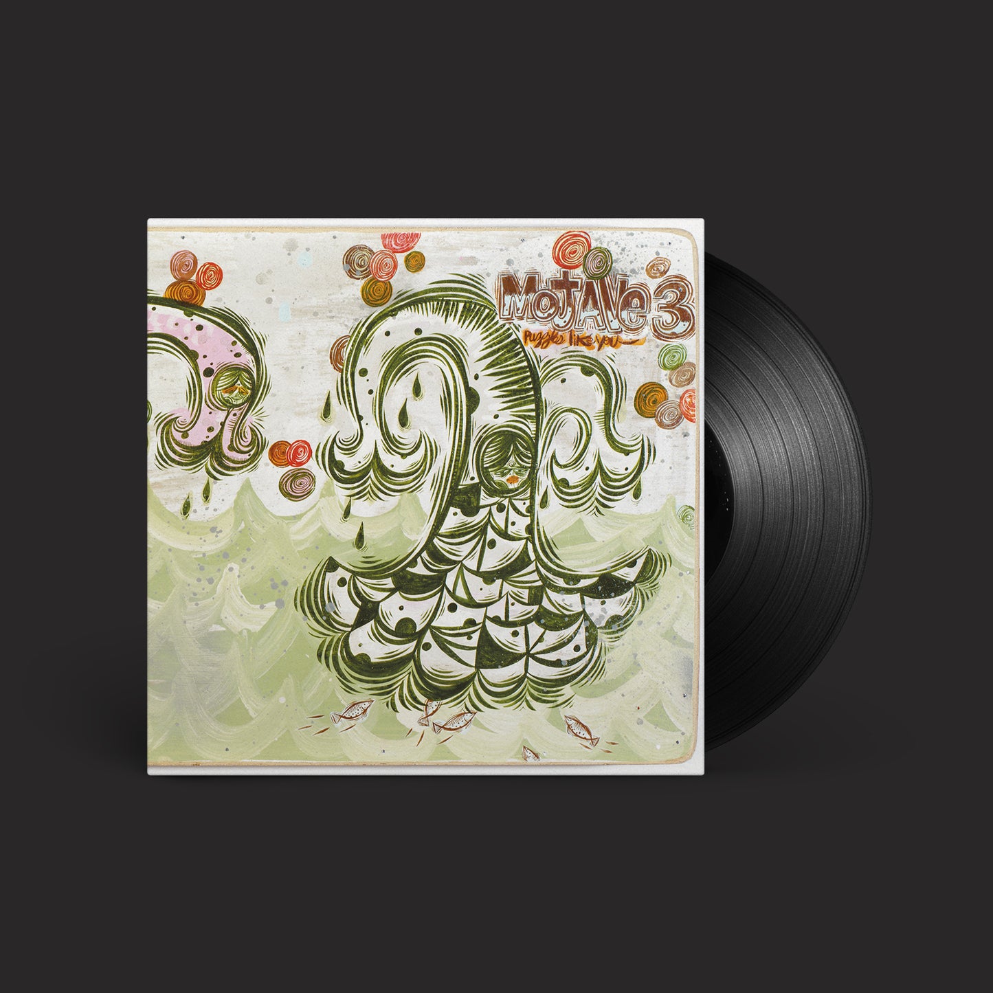 Mojave 3 album cover and vinyl record with swirling green and orange designs.