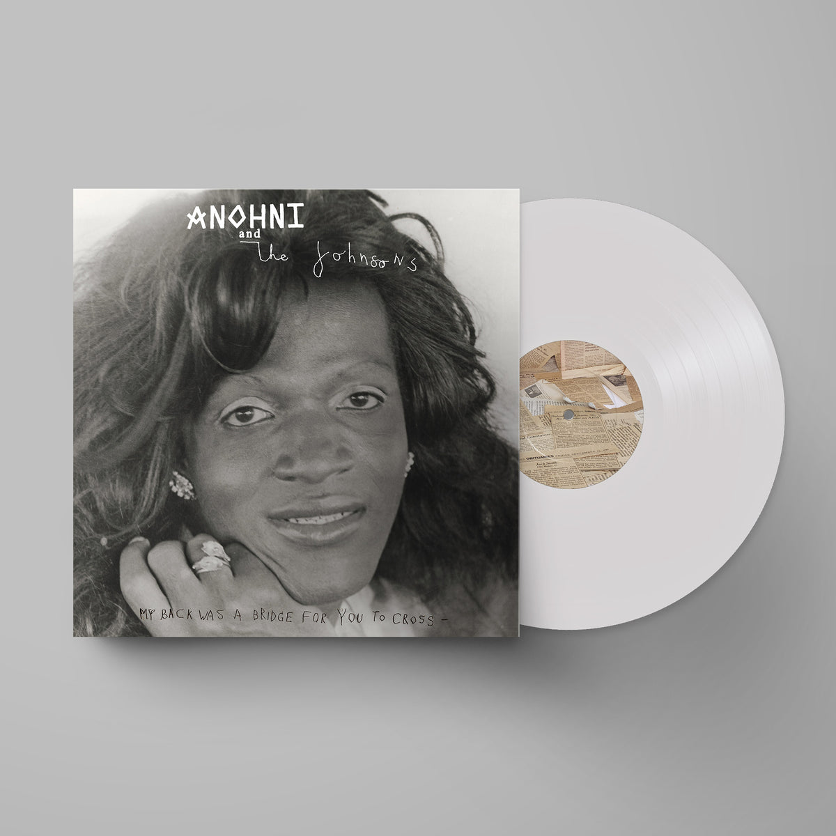ANOHNI album cover with a portrait and white vinyl record shown.