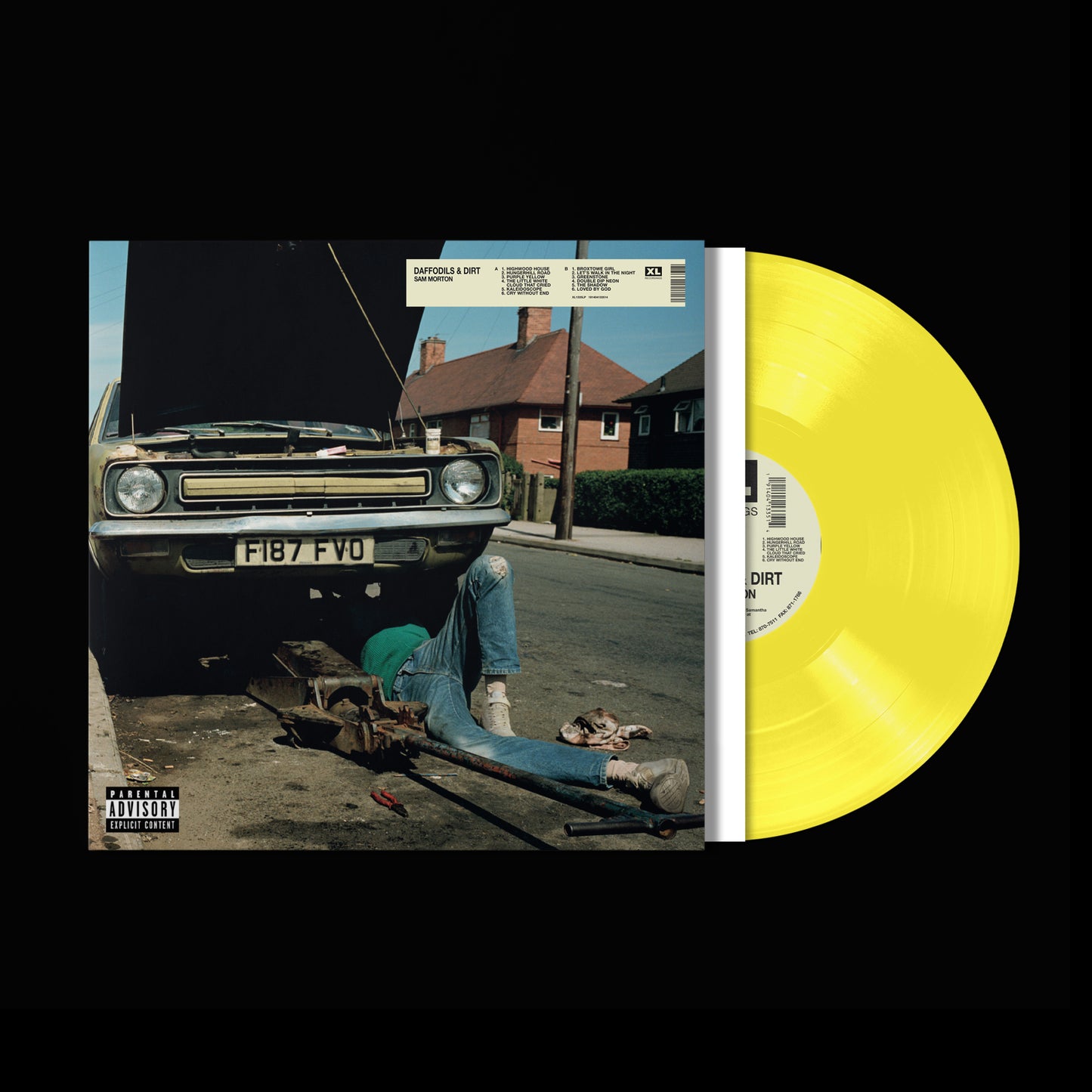 Yellow vinyl record with a cover showing a car and person outdoors.