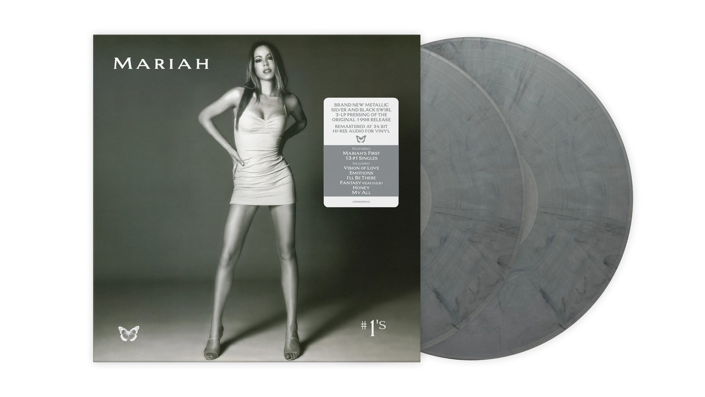 Mariah Carey #1s vinyl album cover with two metallic silver and black swirl records.