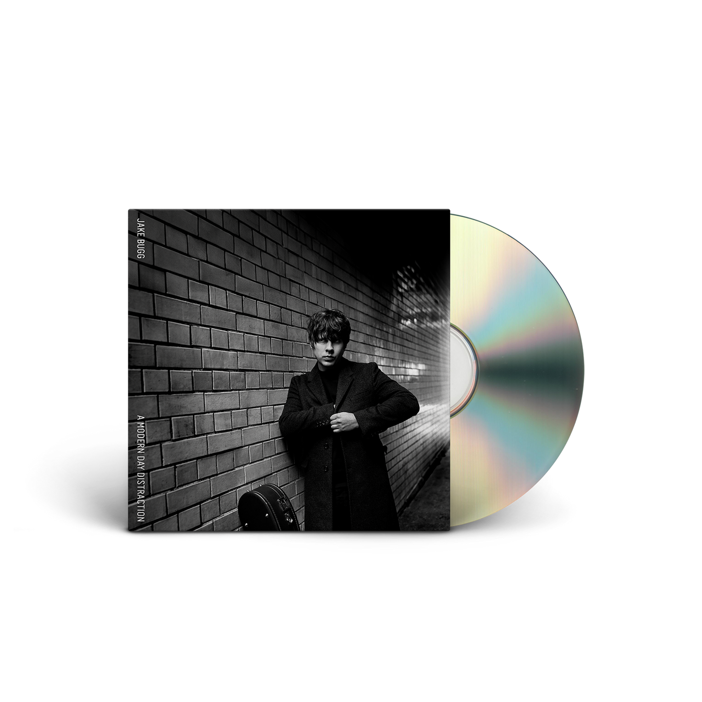 Jake Bugg album cover: a man in a coat against a brick wall.