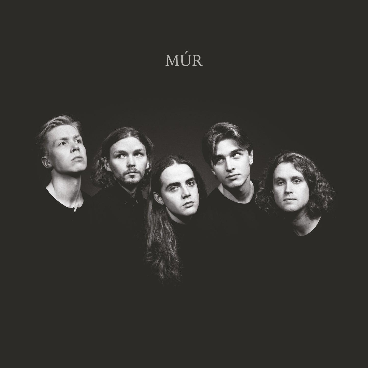 Black and white album cover featuring a band of four people.
