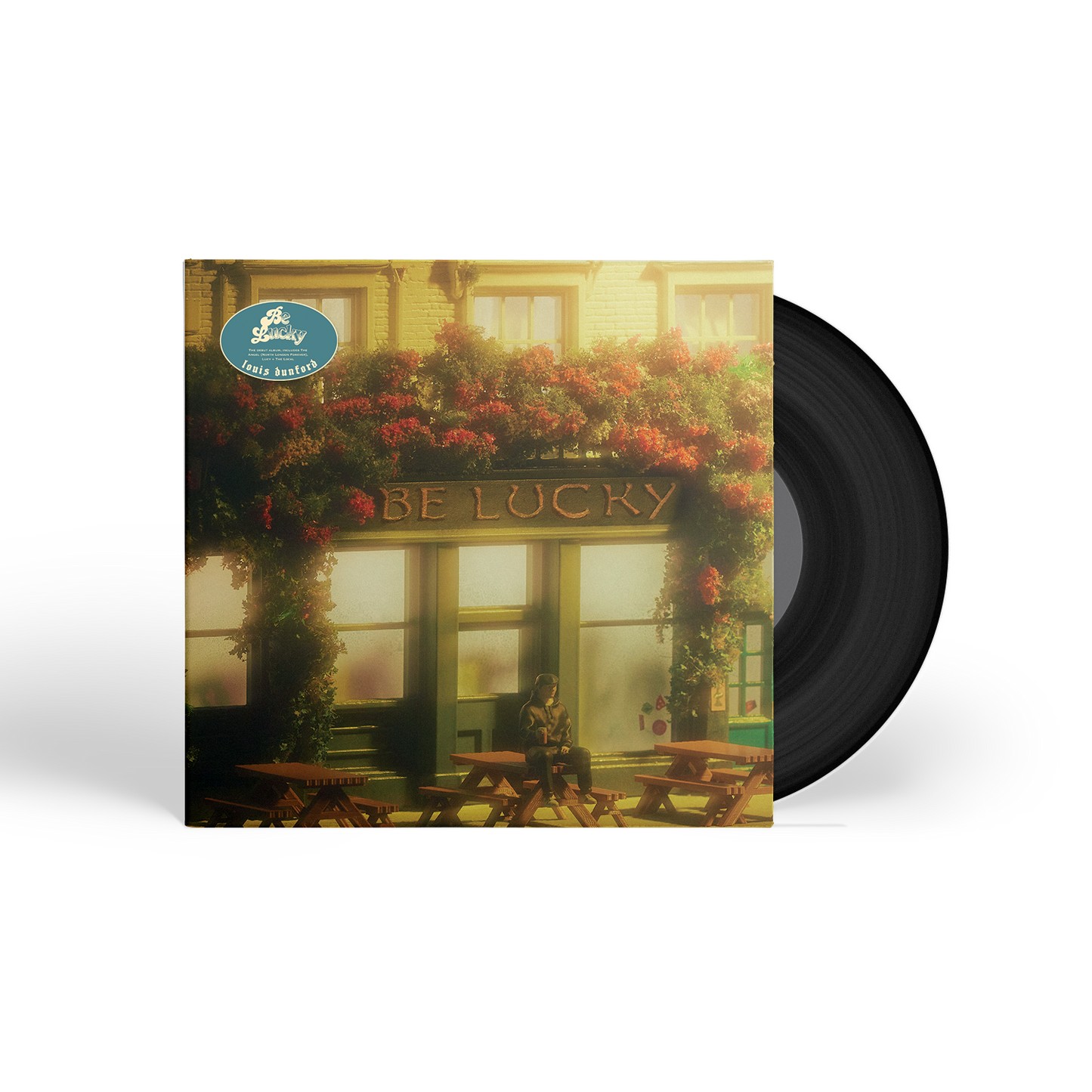 Vinyl record cover showing a person sitting at a pub table with floral decor.