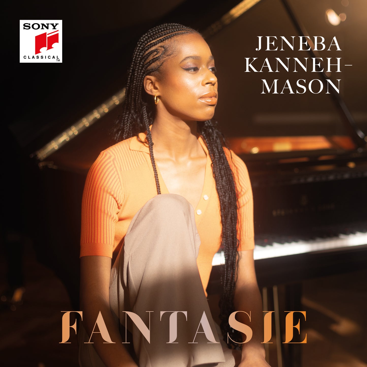CD cover featuring Jeneba Kanneh-Mason, a young Black woman, with a piano.