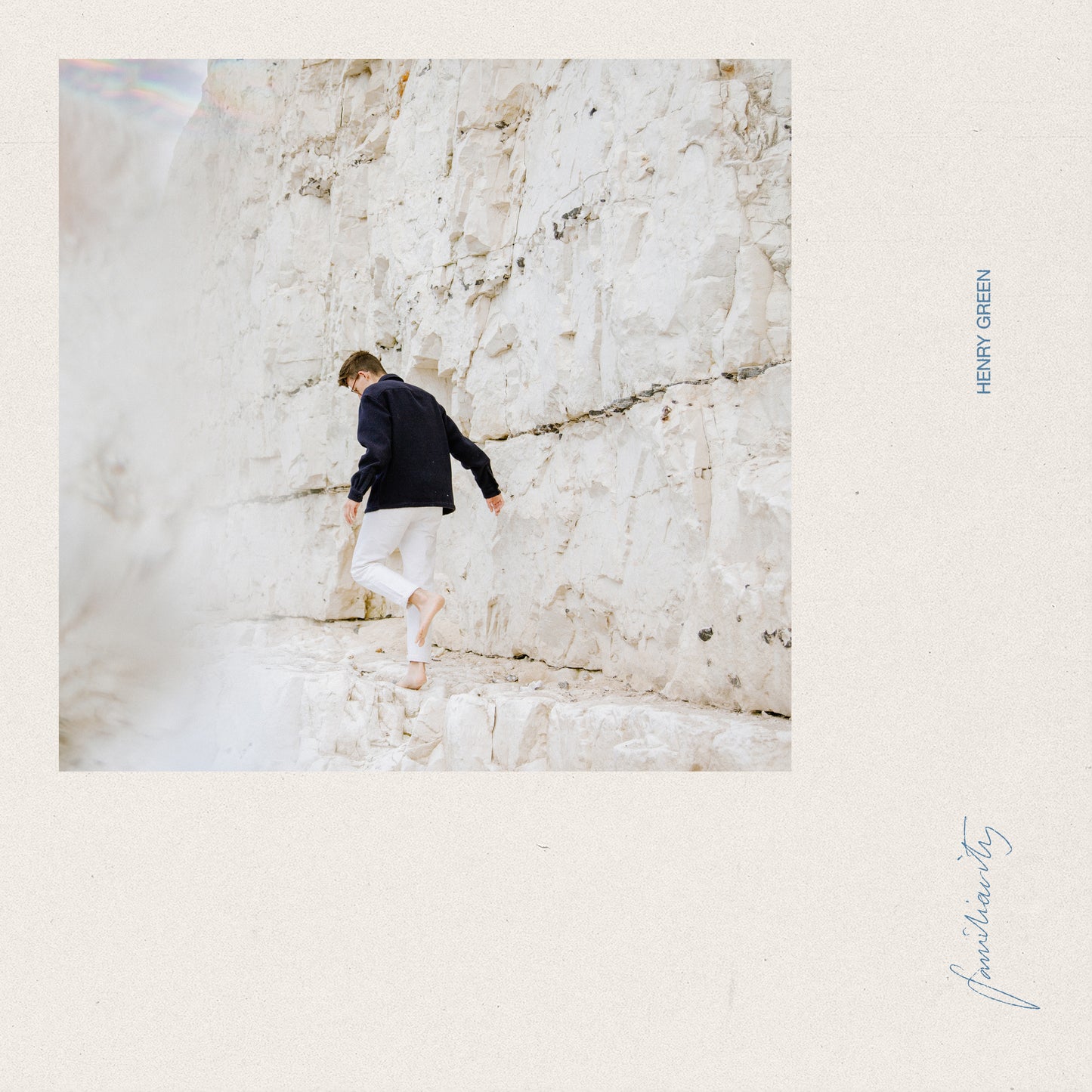 Vinyl album cover: man walking on white cliffs, text "Henry Green".