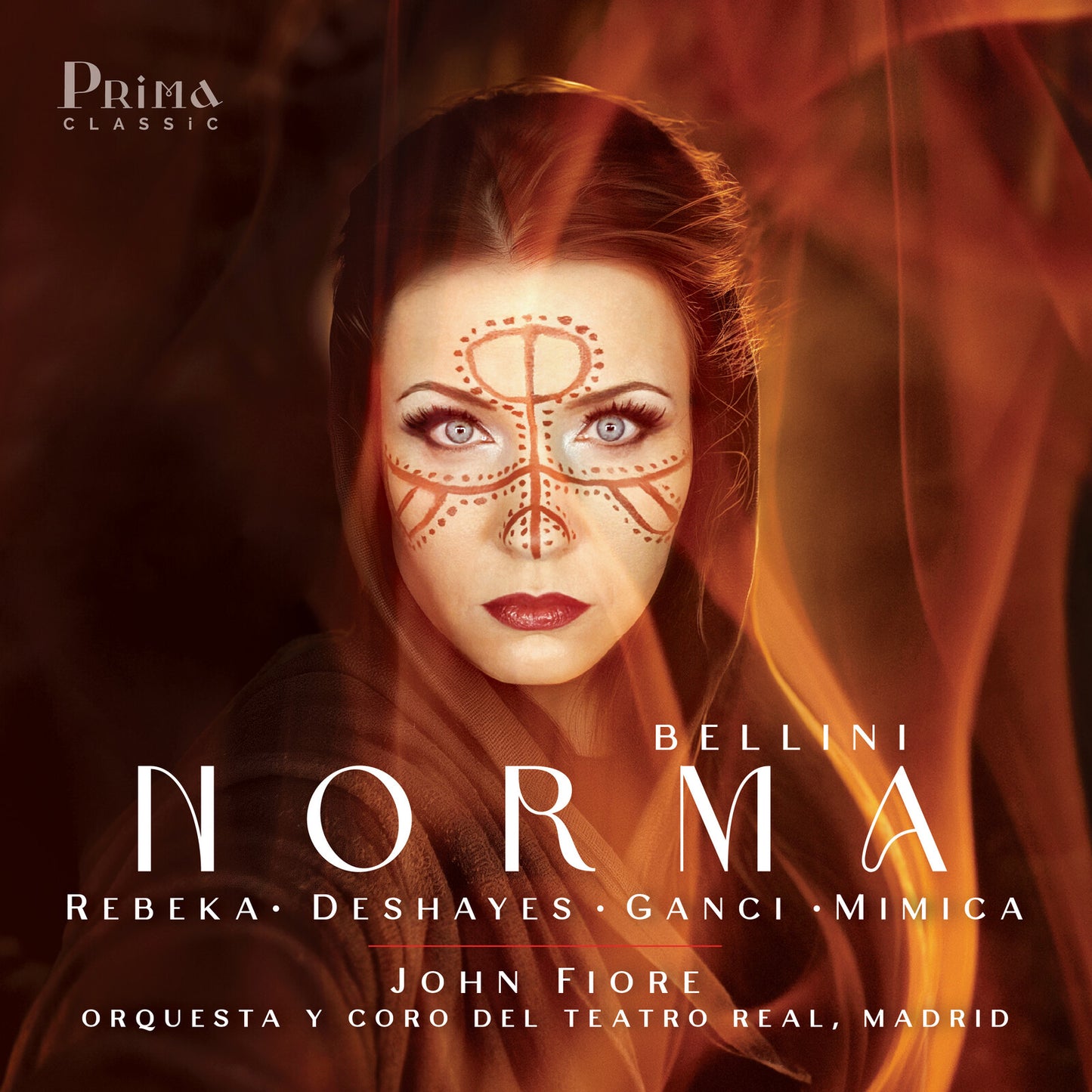 CD cover: opera singer Marina Rebeka with dramatic face paint and title "Norma".