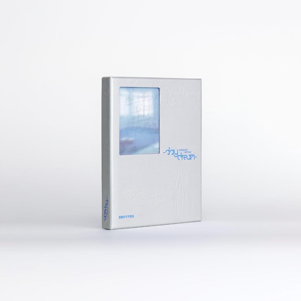 ENHYPEN “Untold – daydream” CD case, light blue with abstract art.