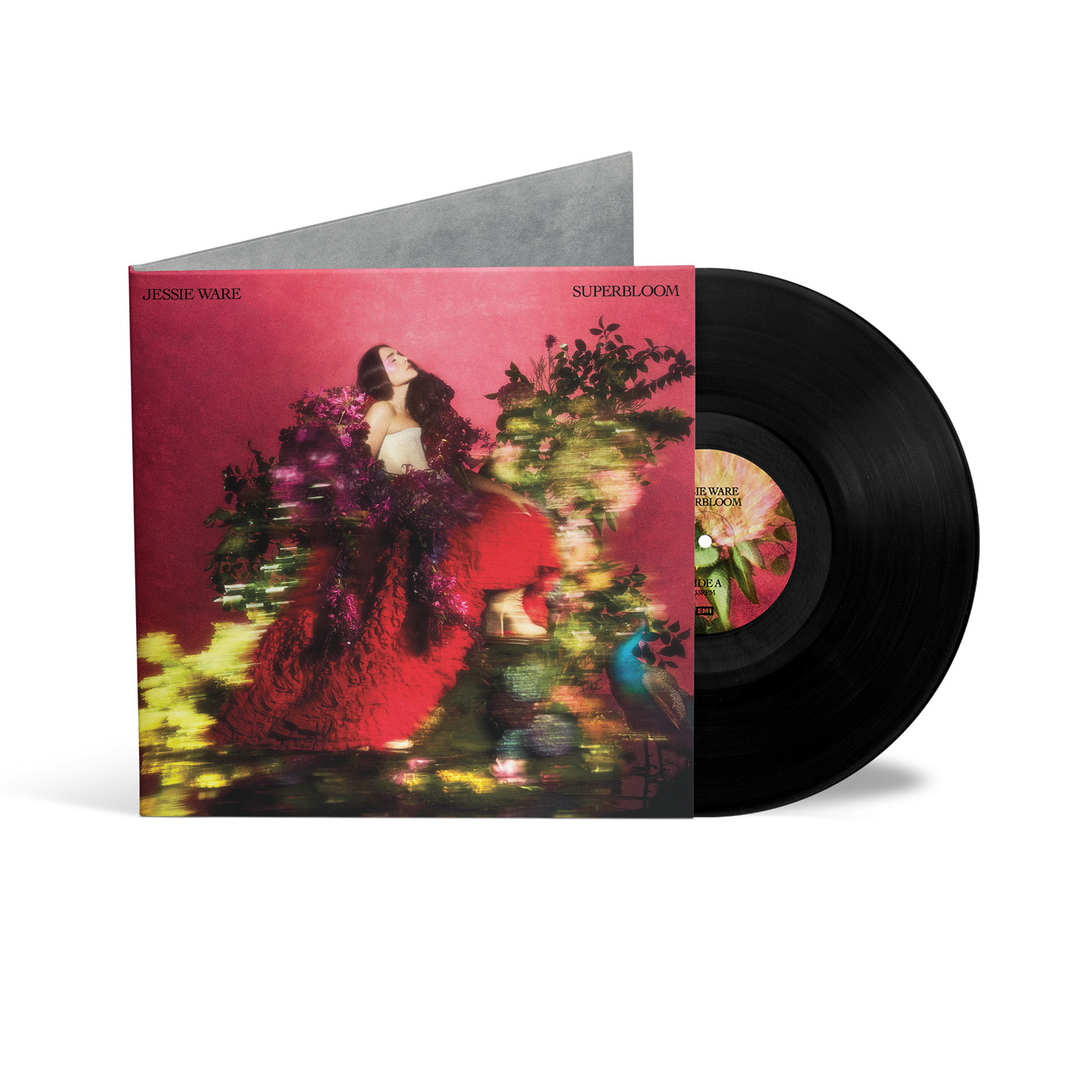 Jessie Ware album cover: woman in red dress surrounded by flowers.