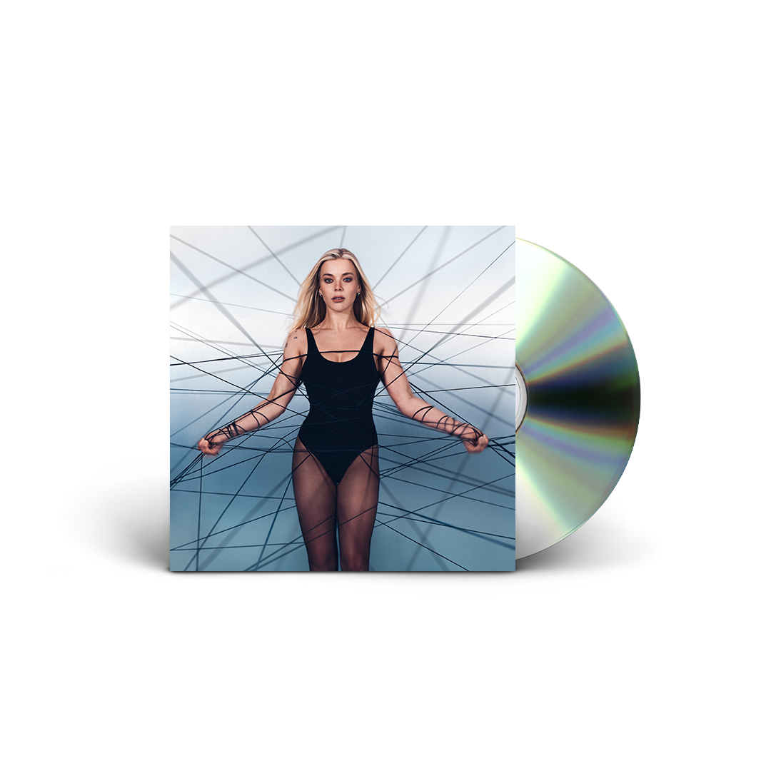 Becky Hill’s “REBECCA” CD cover with artist in black bodysuit and web-like lines.