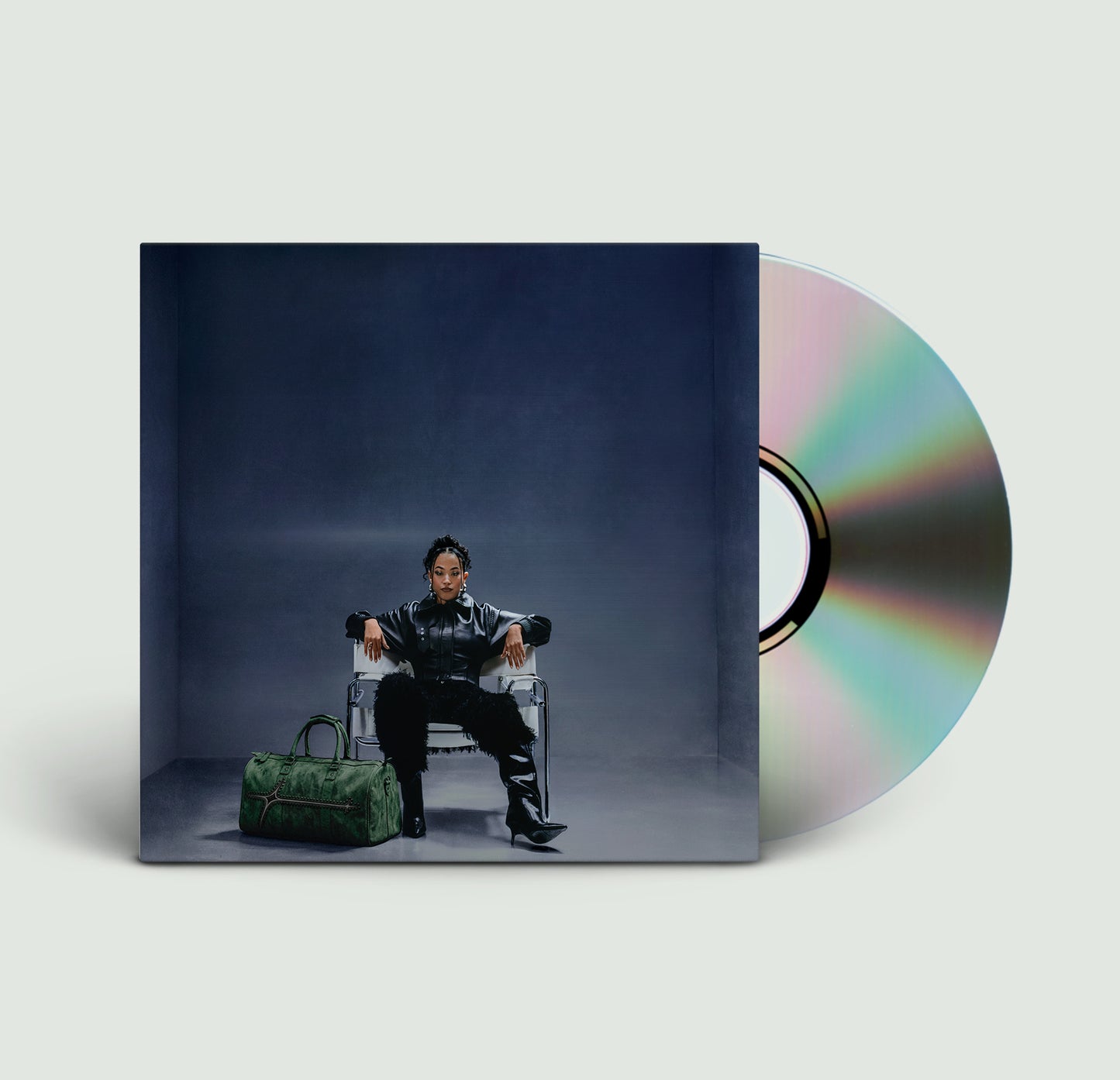 CD case and disc featuring a woman in a dark outfit.