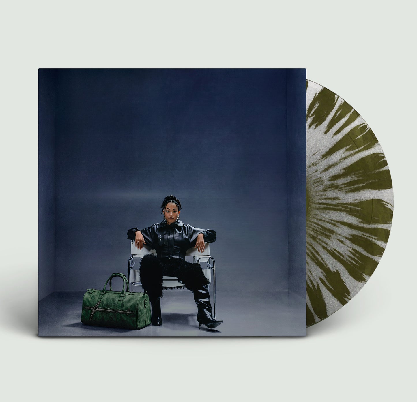 Vinyl LP cover featuring Jazzy in a leather jacket, with splatter effect record.