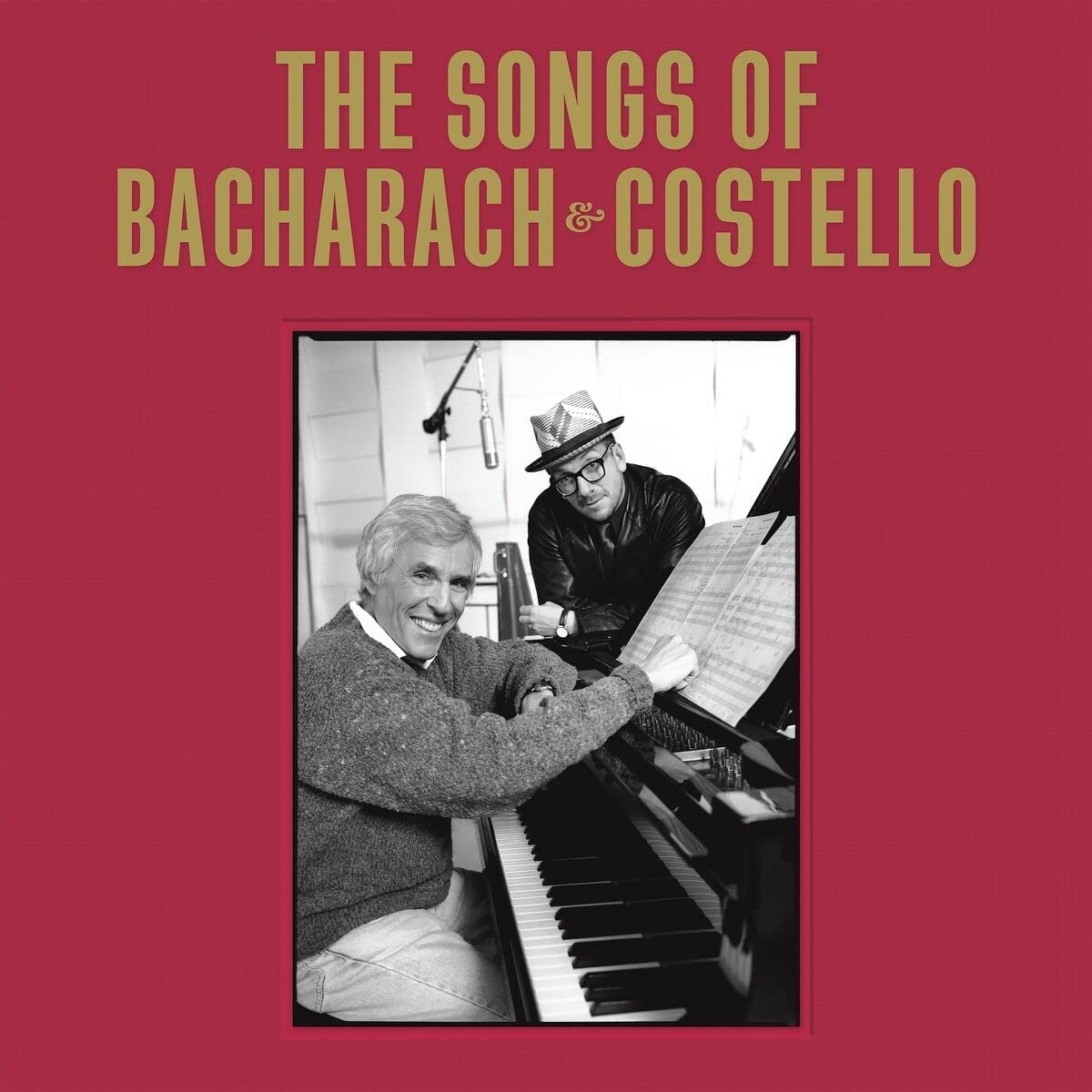 Burt Bacharach and Elvis Costello at a piano, album cover.