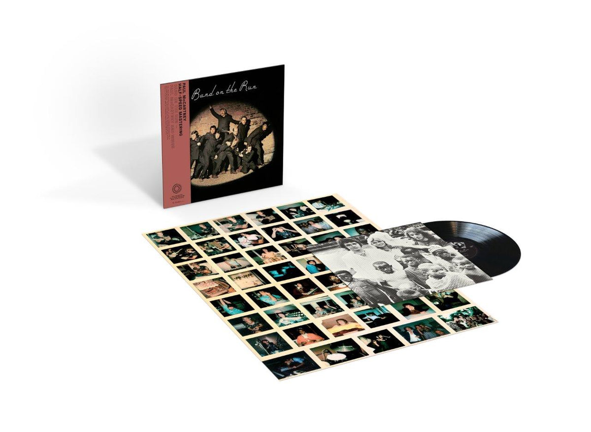 “Band On The Run” vinyl record with album artwork and photo collage insert.