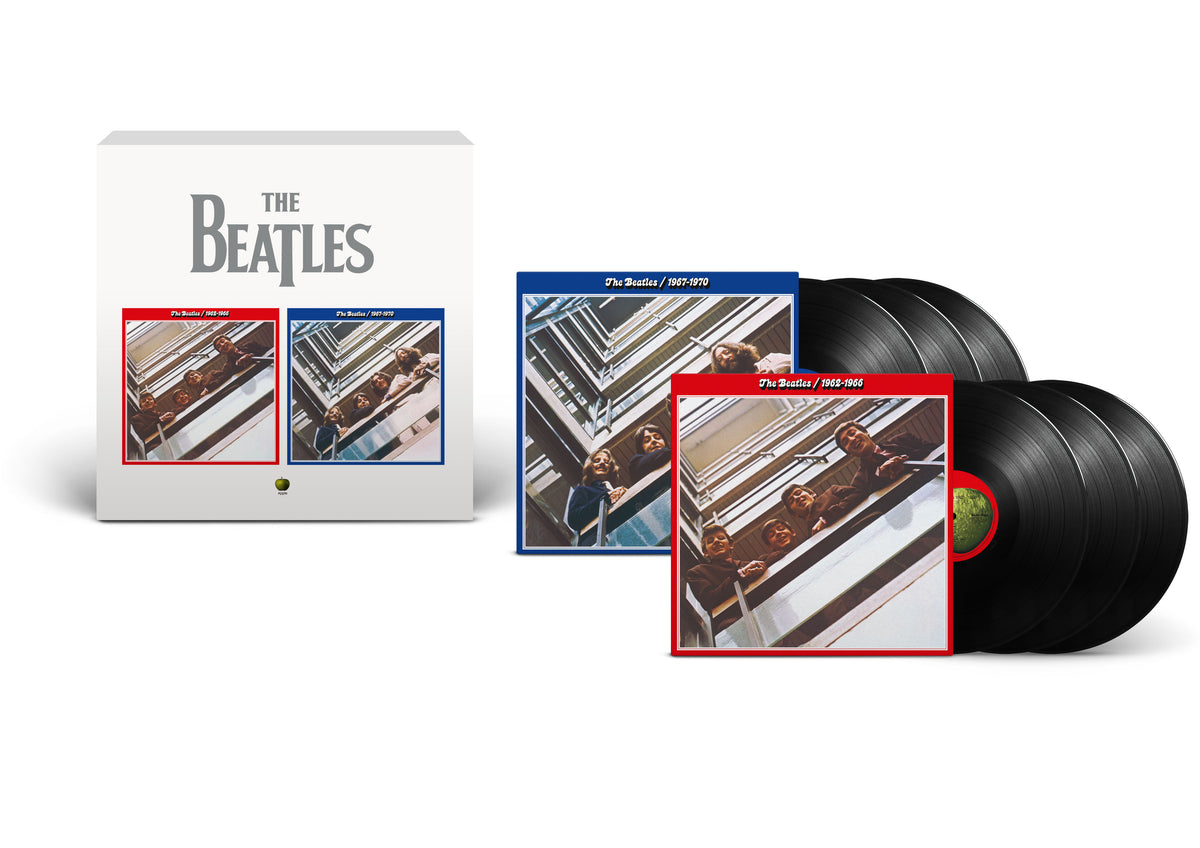 The Beatles vinyl box set with album covers and black records.