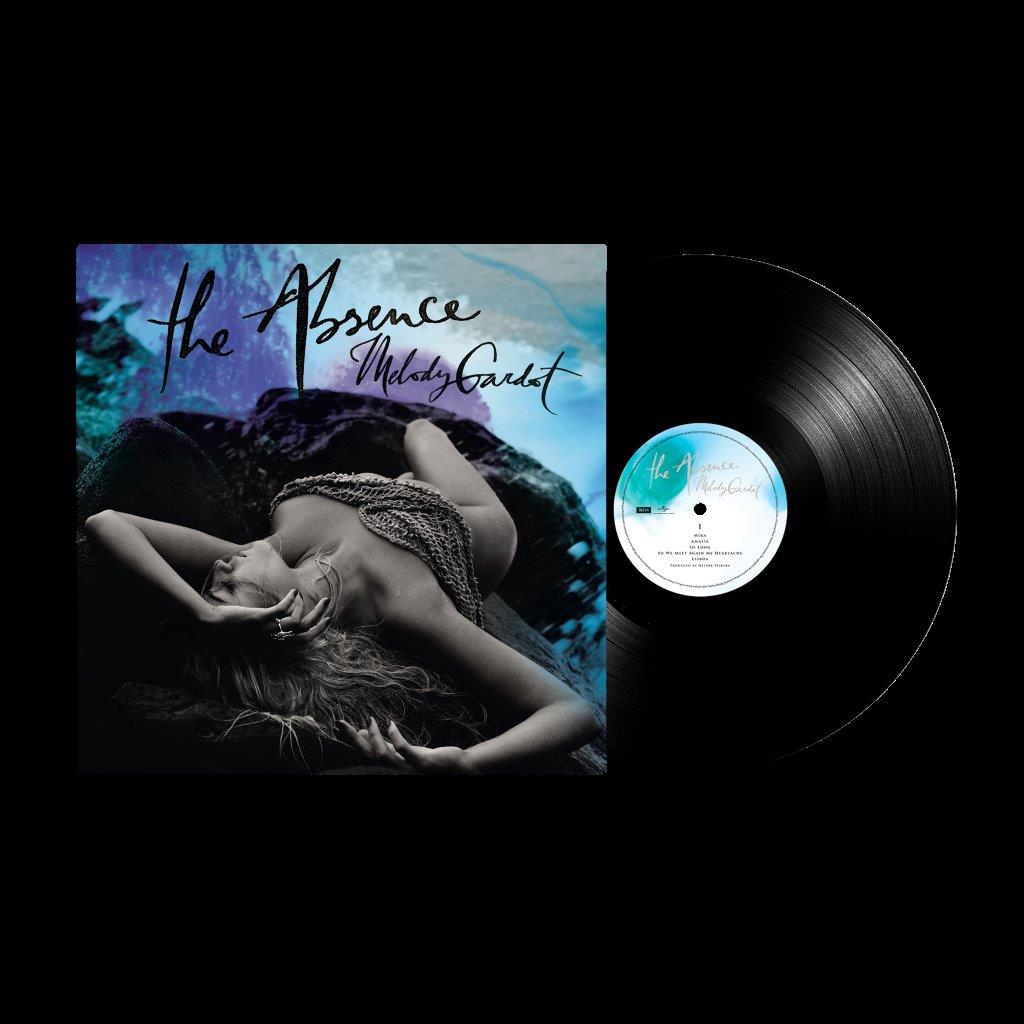 Melody Gardot's "The Absence" vinyl record and album cover featuring a woman.
