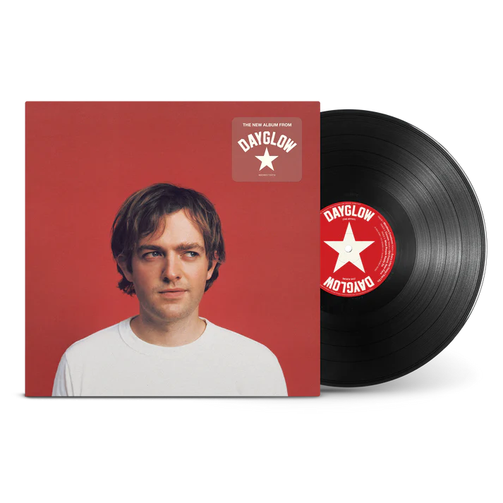 Dayglow album cover and vinyl record with a portrait of a man.