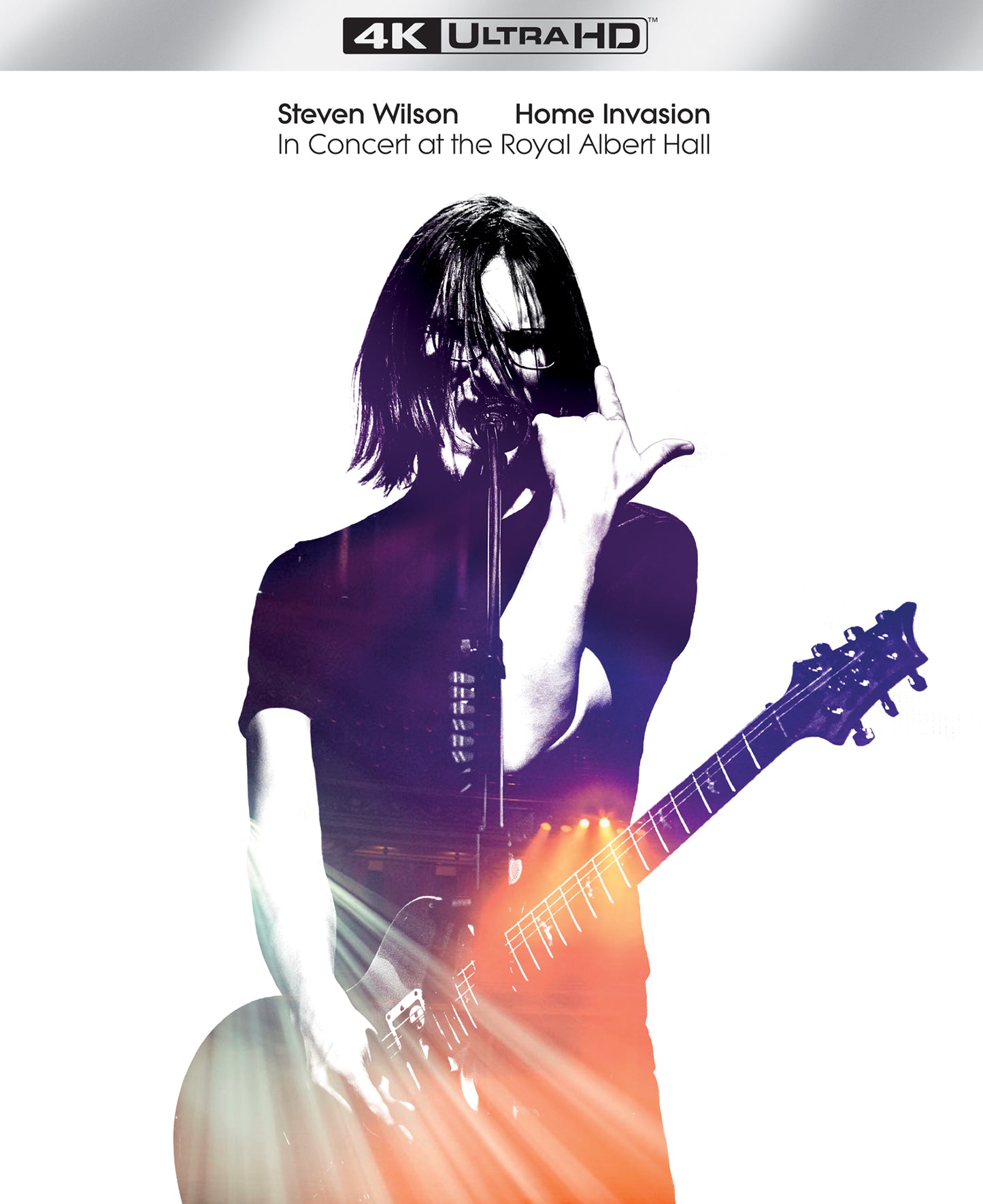 Steven Wilson performing live on stage, superimposed over a concert scene on white background.