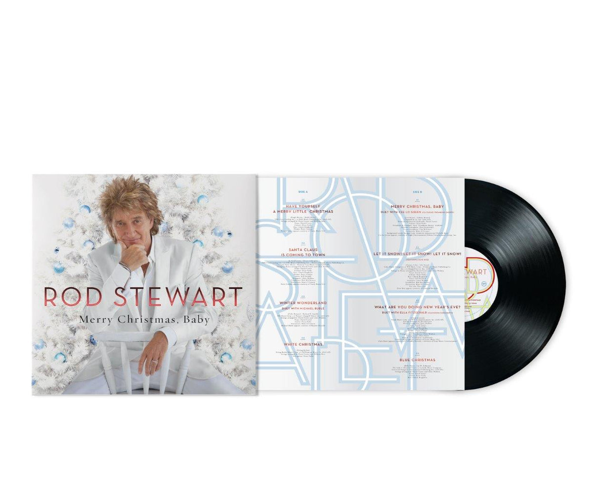 Rod Stewart's "Merry Christmas, Baby" vinyl record with tracklist displayed.