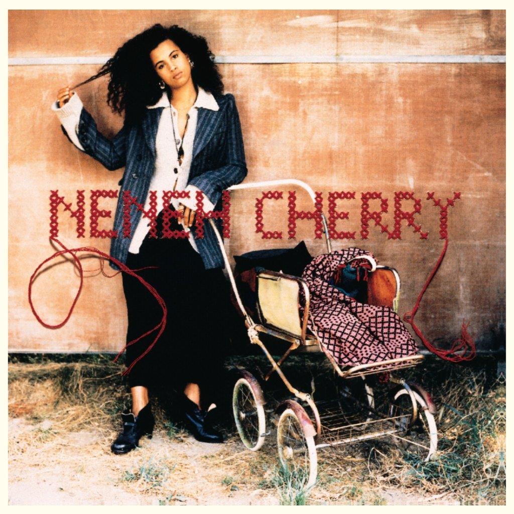Neneh Cherry album cover featuring the artist with a baby carriage.