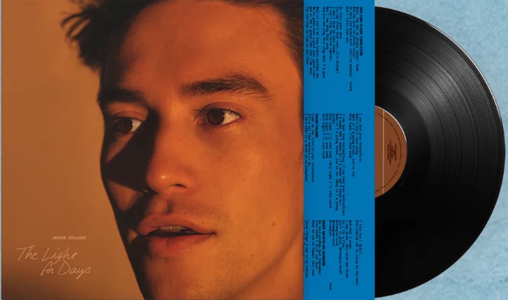 Jacob Collier album cover with portrait, lyrics, and vinyl record.