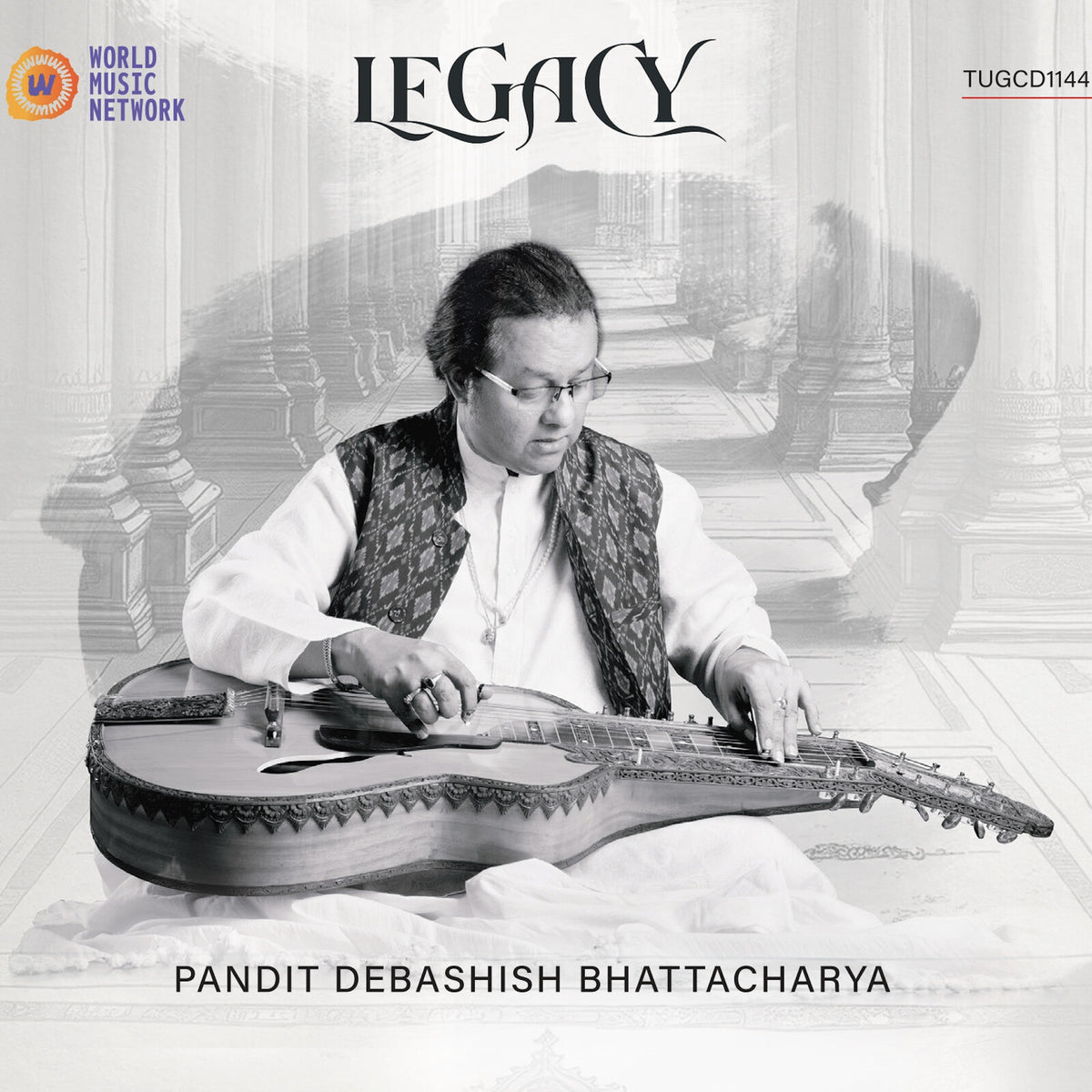 Debashish Bhattacharya playing a unique stringed instrument on CD cover.