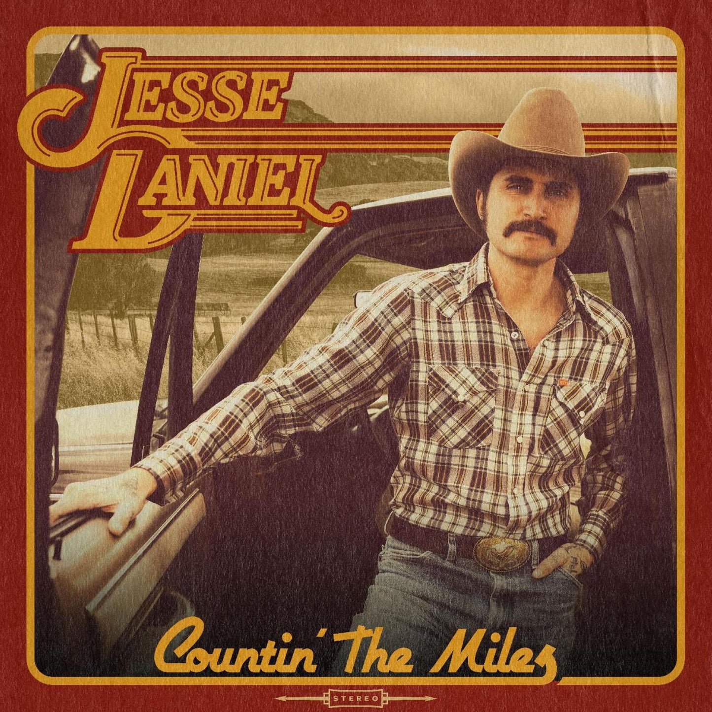 Jesse Daniel album cover: portrait of a cowboy with tan background.