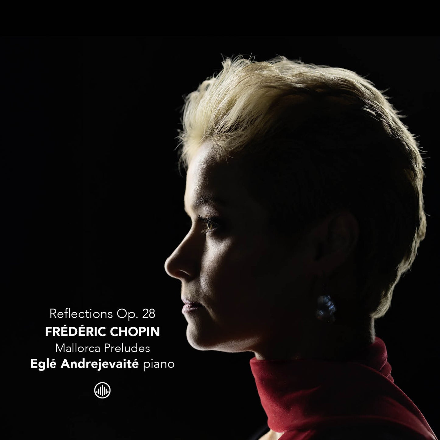 Profile of a woman with blonde hair against a black background.