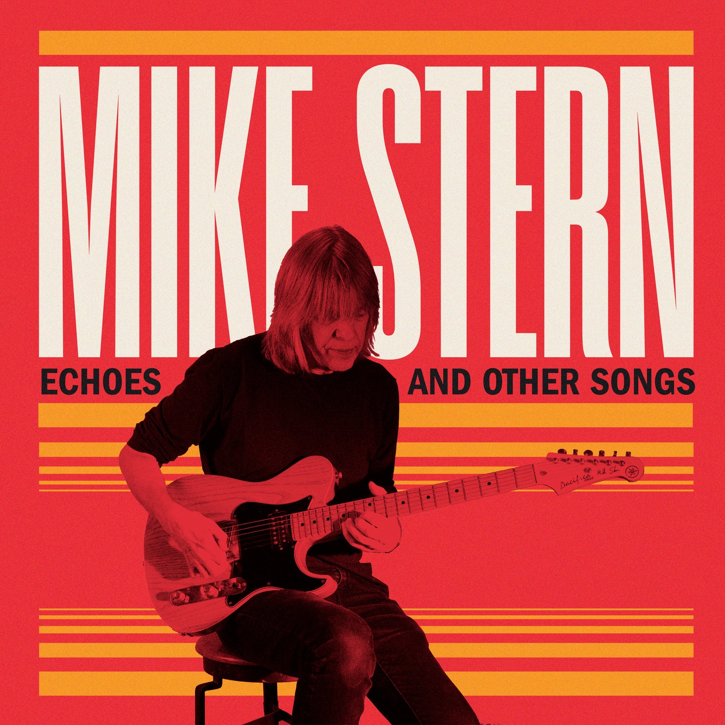 Mike Stern album cover: guitarist playing on a red and gold background.