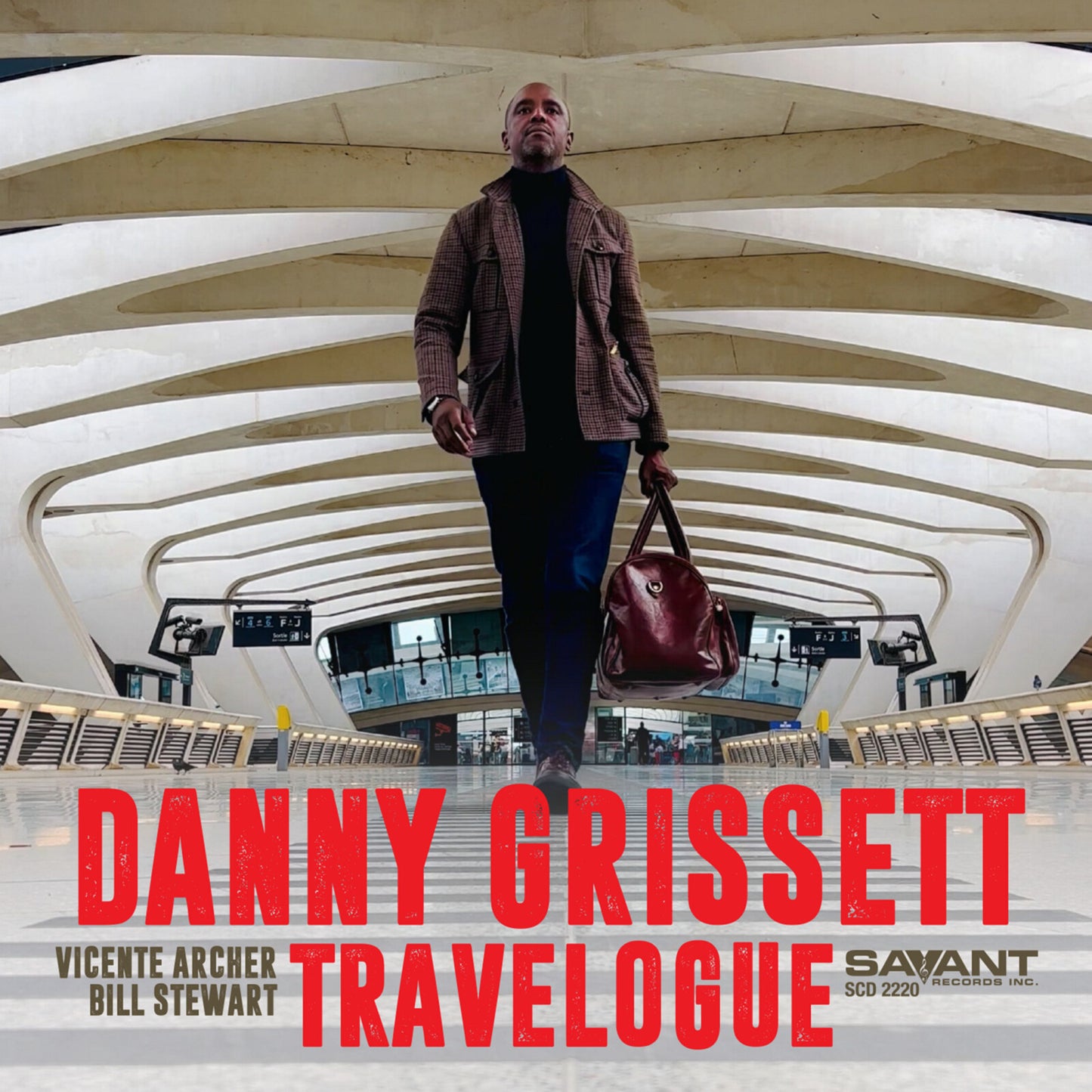 CD cover: Danny Grissett standing in a train station, album title “Travelogue”.