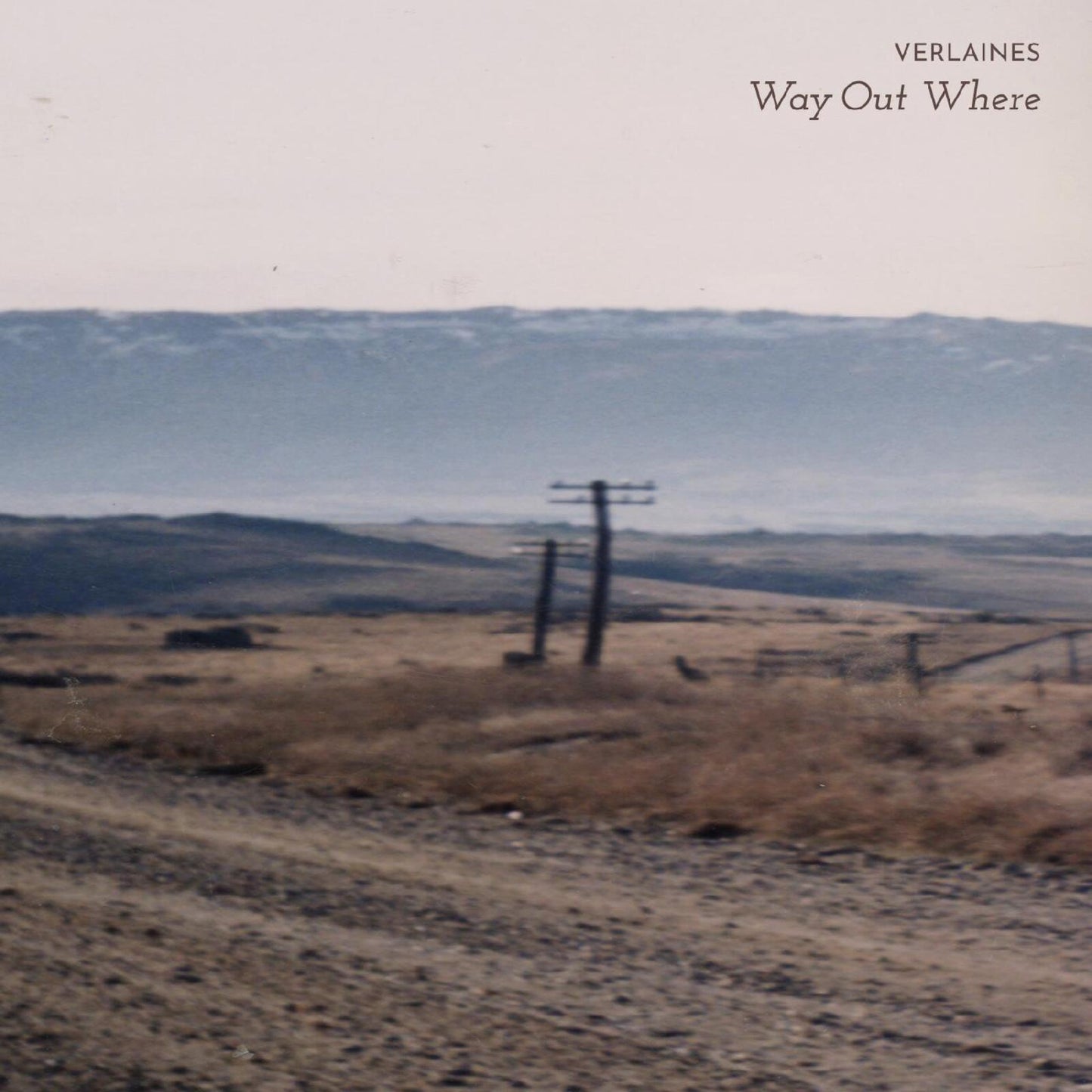 Album cover: desolate landscape with power lines, titled “Way Out Where”.