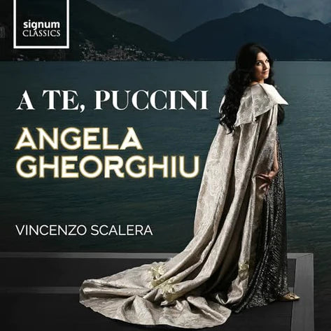CD cover featuring Angela Gheorghiu in a gown by a lake.