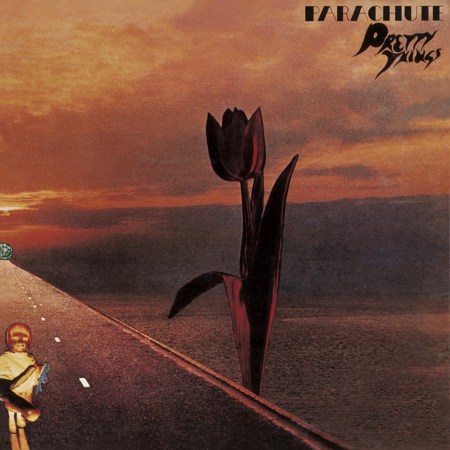 Album cover showing a large tulip on a road at sunset with a figure.