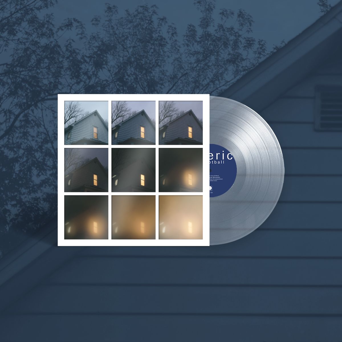 Vinyl record and album cover with a grid of illuminated houses.