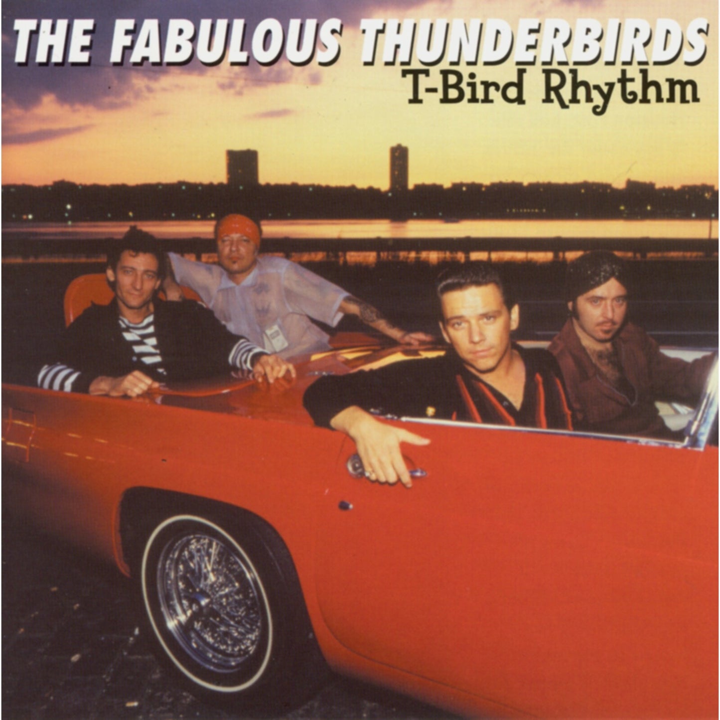 Fabulous Thunderbirds album cover featuring four men in a red convertible.