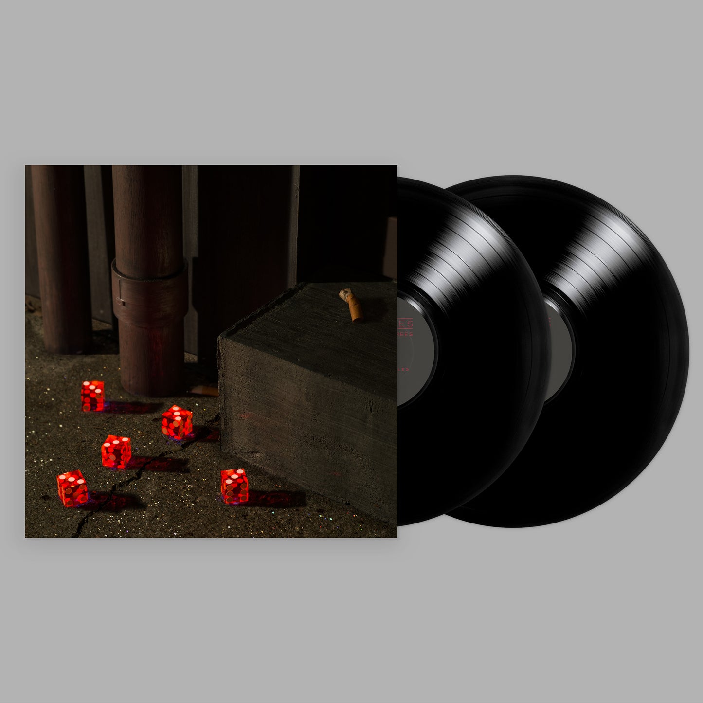 Vinyl record cover with dark, moody image of dice and a cigarette.