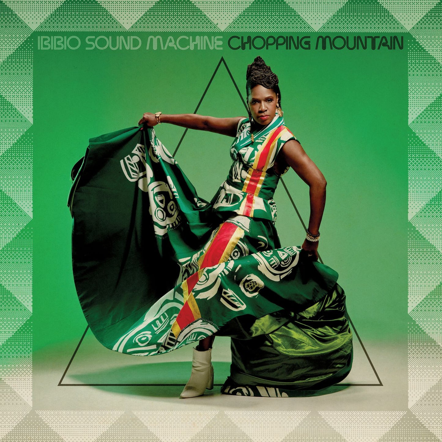 Album cover for Ibibio Sound Machine’s “Chopping Mountain” featuring a woman in vibrant attire.