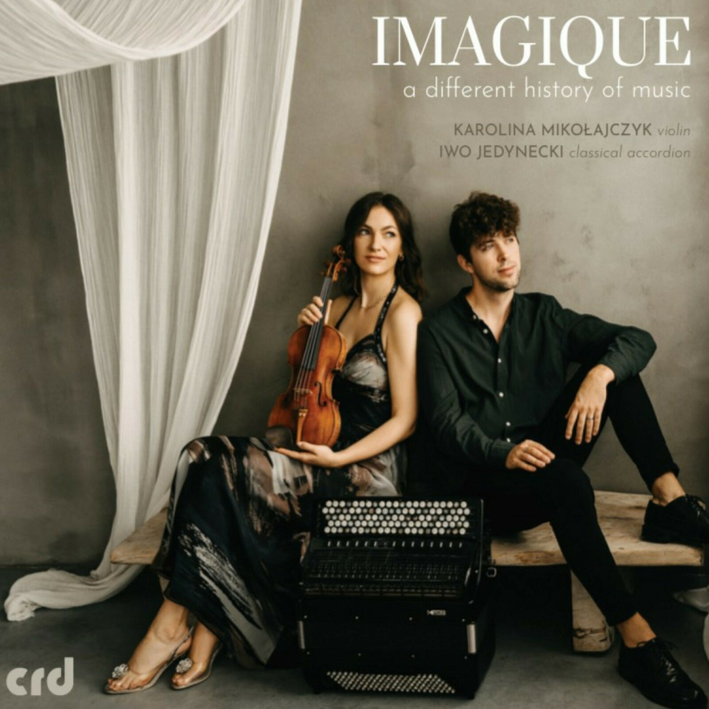 CD cover featuring two musicians with violin and accordion.