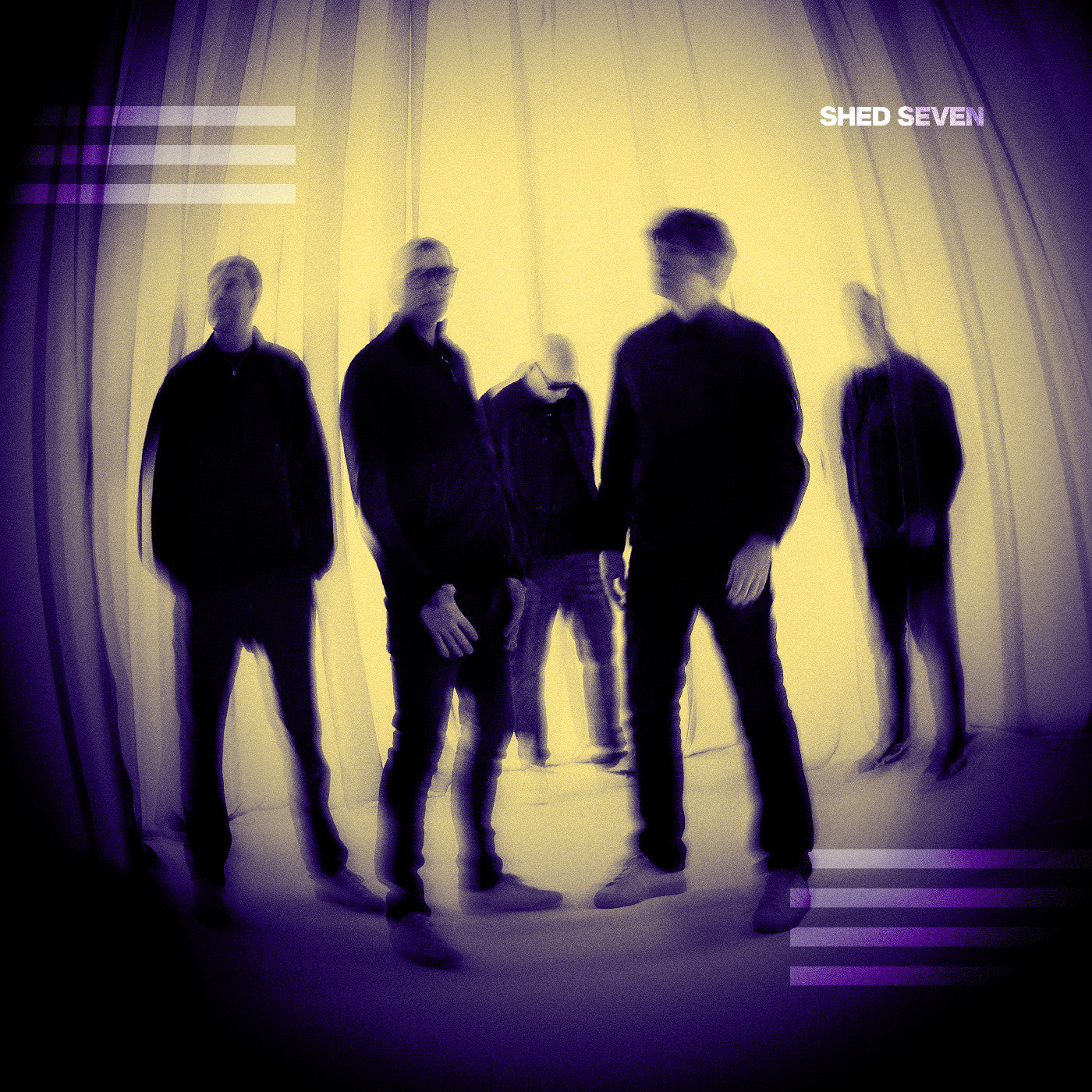 Blurred image of four figures in dark clothing against a yellow background.