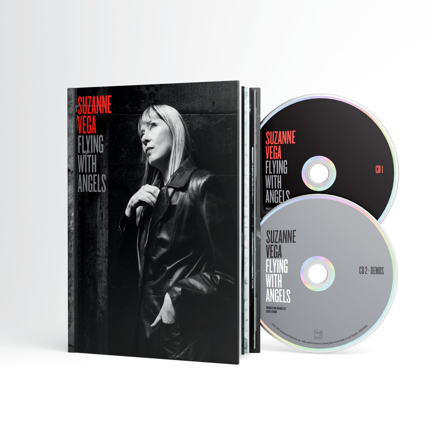 Suzanne Vega “Flying With Angels” CD case and two silver discs.