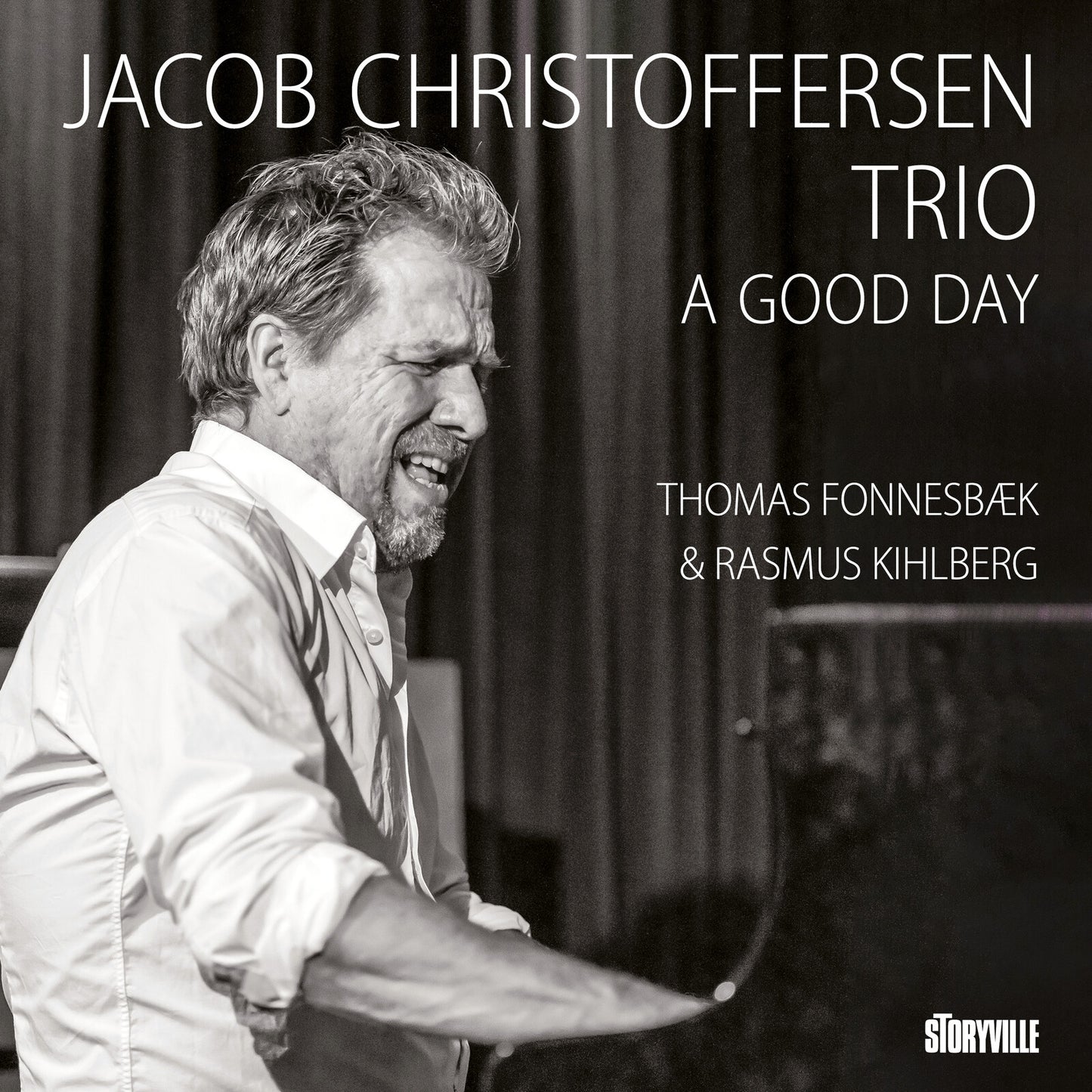 Black and white album cover featuring a smiling pianist, Jacob Christoffersen.