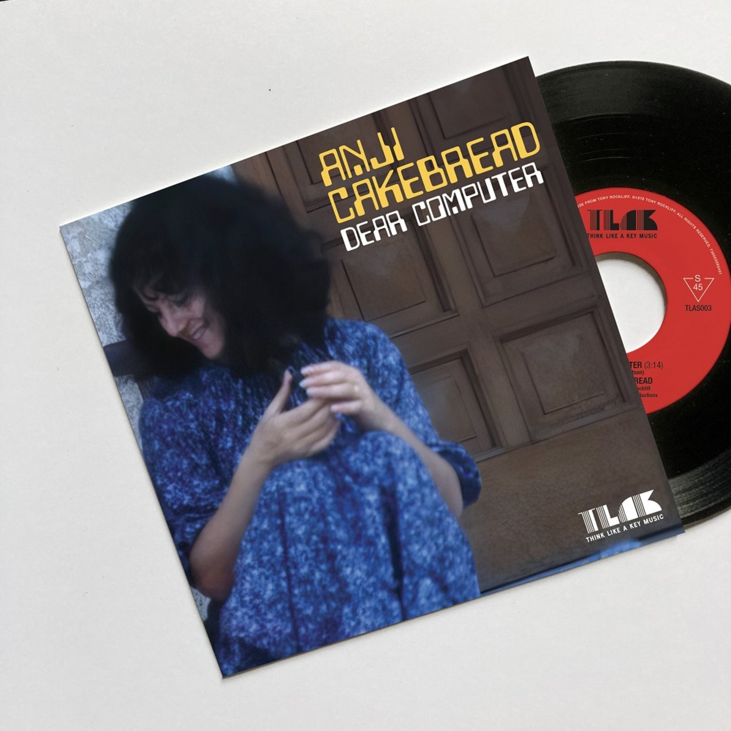 Vinyl record cover featuring a portrait of Anji Cakebread.