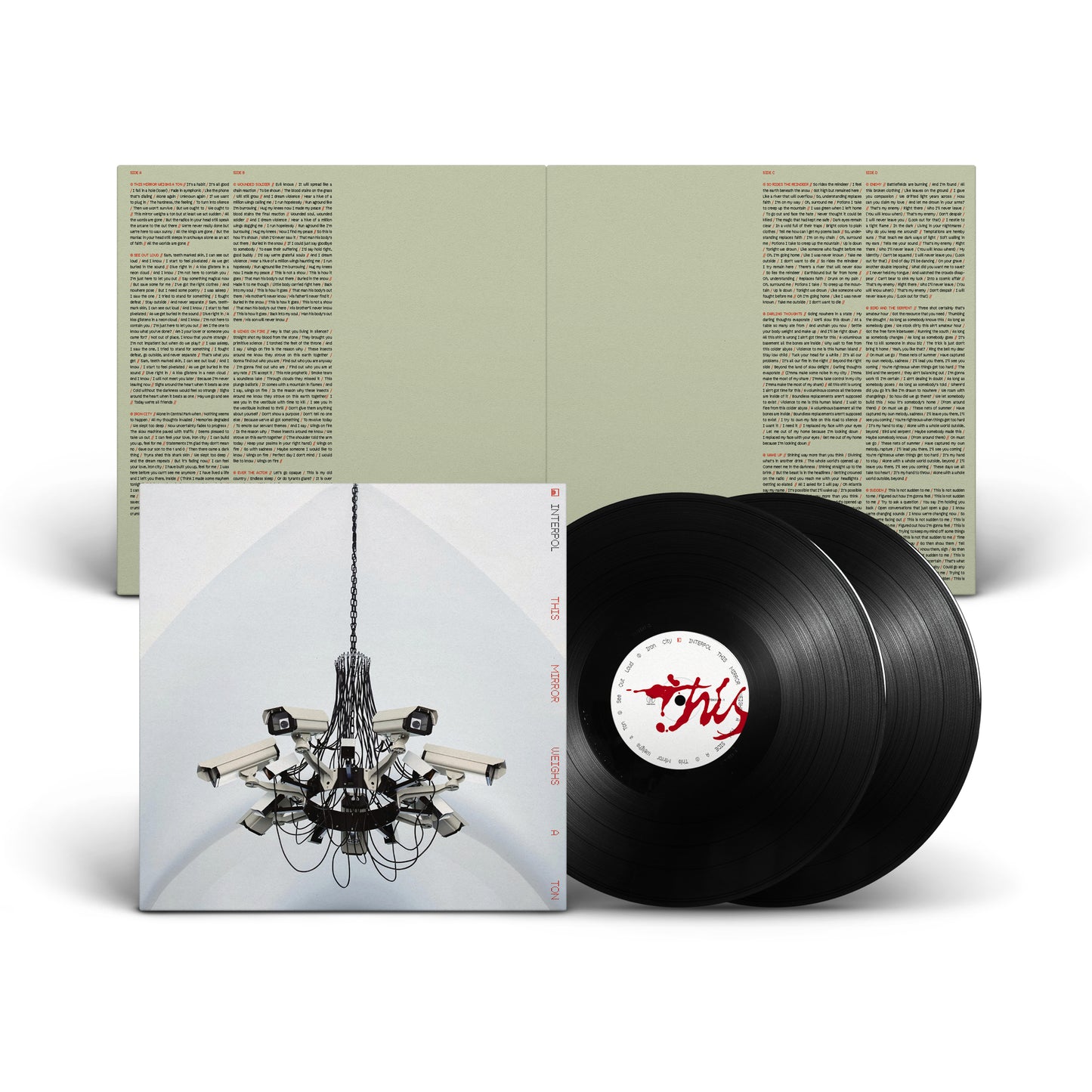 Interpol album “This Mirror Weighs A Ton” vinyl record with cover art.