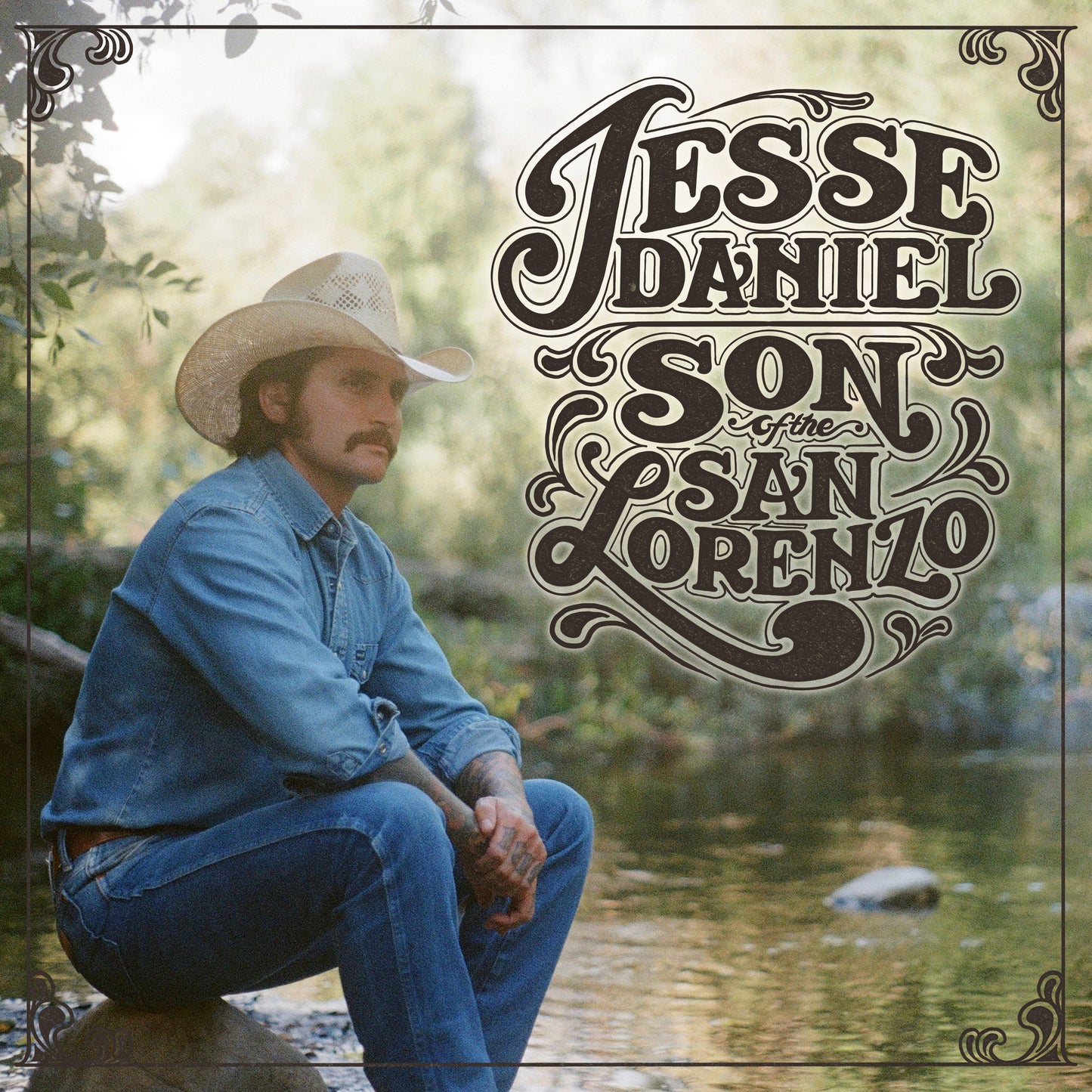 CD cover featuring Jesse Daniel, a man in a cowboy hat and denim.